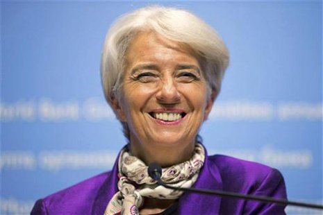 International Monetary Fund (IMF) Managing Director Christine Lagarde smiles as she answers a questions during a news conference at the IMF International Monetary Fund (IMF) Managing Director Christine Lagarde smiles as she answers a questions during a news conference at the IMF