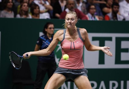 Russia's Maria Sharapova hits a return to Serena Williams of the U.S. during their final WTA tennis championships match in Istanbul, October Russia's Maria Sharapova hits a return to Serena Williams of the U.S. during their final WTA tennis championships match in Istanbul, October
