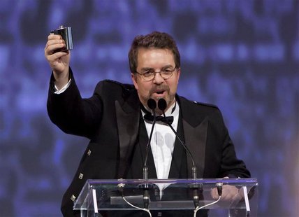 Will Ferguson toasts to the audience during his speech after winning the Scotiabank Giller Prize for his novel "419" at the Ritz-Carlton in Will Ferguson toasts to the audience during his speech after winning the Scotiabank Giller Prize for his novel "419" at the Ritz-Carlton in