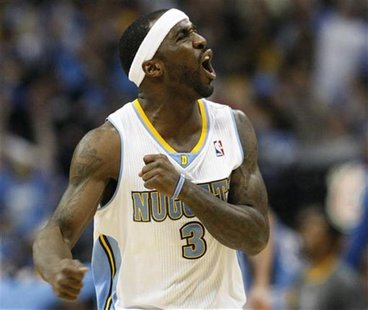 Denver Nuggets guard Ty Lawson celebrates hitting a three-point basket against the Los Angeles Lakers early in Game 6 of their NBA Western C Denver Nuggets guard Ty Lawson celebrates hitting a three-point basket against the Los Angeles Lakers early in Game 6 of their NBA Western C