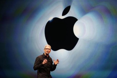Apple Inc. CEO Tim Cook takes the stage during Apple Inc.'s iPhone media event in San Francisco, California September 12, 2012. REUTERS/Beck Apple Inc. CEO Tim Cook takes the stage during Apple Inc.'s iPhone media event in San Francisco, California September 12, 2012. REUTERS/Beck