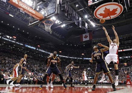 Toronto Raptors Andrea Bargnani puts up a shot over Indiana Pacers David West (21) during the first half of their NBA basketball game in Tor Toronto Raptors Andrea Bargnani puts up a shot over Indiana Pacers David West (21) during the first half of their NBA basketball game in Tor