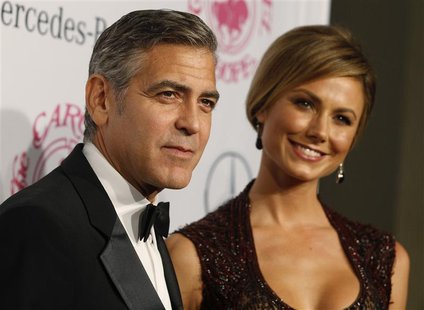 Actor George Clooney and girlfriend Stacy Keibler arrive at the 26th Carousel of Hope Ball in Beverly Hills, California October 20, 2012. RE Actor George Clooney and girlfriend Stacy Keibler arrive at the 26th Carousel of Hope Ball in Beverly Hills, California October 20, 2012. RE