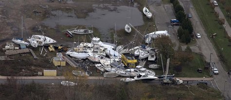 A view of boats from a marina which are washed ashore near Jersey City, New Jersey October 31, 2012. REUTERS/Adrees Latif A view of boats from a marina which are washed ashore near Jersey City, New Jersey October 31, 2012. REUTERS/Adrees Latif