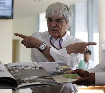Formula One supremo Bernie Ecclestone gestures during the presentation of a commemorative book presented to him on the occasion of his birth Formula One supremo Bernie Ecclestone gestures during the presentation of a commemorative book presented to him on the occasion of his birth
