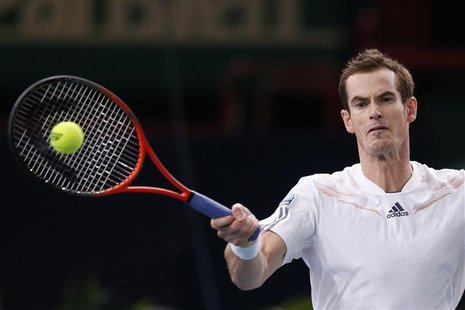 Andy Murray of Britain returns the ball to Poland's Jerzy Janowicz during the Paris Masters tennis tournament November 1, 2012. REUTERS/Beno Andy Murray of Britain returns the ball to Poland's Jerzy Janowicz during the Paris Masters tennis tournament November 1, 2012. REUTERS/Beno