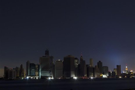 A largely powerless downtown Manhattan stands under a night sky due to a power blackout caused by Hurricane Sandy in New York October 31, 20 A largely powerless downtown Manhattan stands under a night sky due to a power blackout caused by Hurricane Sandy in New York October 31, 20