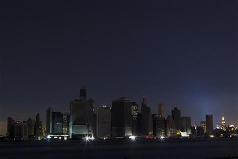 A largely powerless downtown Manhattan stands under a night sky due to a power blackout caused by Hurricane Sandy in New York October 31, 20 A largely powerless downtown Manhattan stands under a night sky due to a power blackout caused by Hurricane Sandy in New York October 31, 20