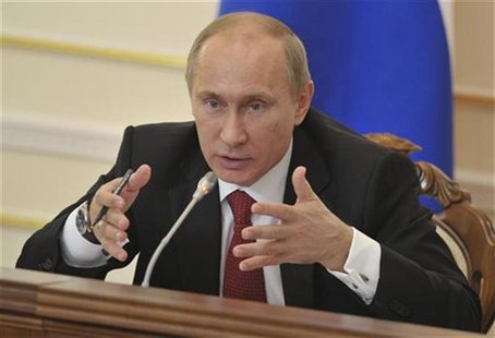 Russia's President Vladimir Putin chairs a Presidential Council meeting on science and education at the Novo-Ogaryovo residence outside Mosc Russia's President Vladimir Putin chairs a Presidential Council meeting on science and education at the Novo-Ogaryovo residence outside Mosc