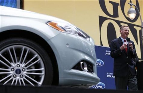 Alan Mulally, President and CEO of Ford Motor Company attends a launch event for the New 2013 Ford Fusion Hybrid car in New York's Times Squ Alan Mulally, President and CEO of Ford Motor Company attends a launch event for the New 2013 Ford Fusion Hybrid car in New York's Times Squ