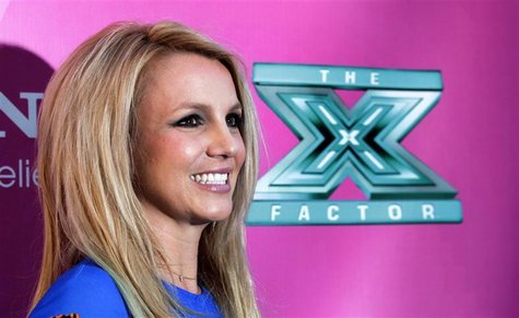 Judge Britney Spears poses at the season two premiere of the television series "The X Factor" at Grauman's Chinese theatre in Hollywood, Cal Judge Britney Spears poses at the season two premiere of the television series "The X Factor" at Grauman's Chinese theatre in Hollywood, Cal