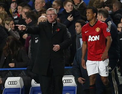 Manchester United's manager Alex Ferguson gestures as Nani looks on during their English League Cup soccer match against Chelsea at Stamford Manchester United's manager Alex Ferguson gestures as Nani looks on during their English League Cup soccer match against Chelsea at Stamford