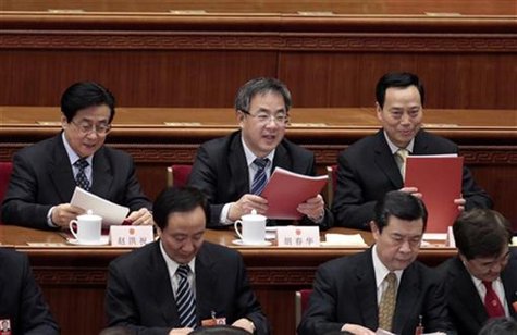 Hu Chunhua (top C), Communist Party chief of north China's Inner Mongolia Autonomous Region, attends the closing ceremony of the National Pe Hu Chunhua (top C), Communist Party chief of north China's Inner Mongolia Autonomous Region, attends the closing ceremony of the National Pe