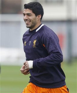 Liverpool's Luis Suarez smiles during a training session at the club's Melwood training complex in Liverpool, northern England, October 24, Liverpool's Luis Suarez smiles during a training session at the club's Melwood training complex in Liverpool, northern England, October 24,