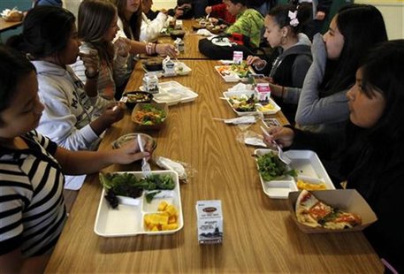 Students sit down to eat a healthy lunch at Marston Middle School in San Diego, California, March 7, 2011. REUTERS/Mike Blake Students sit down to eat a healthy lunch at Marston Middle School in San Diego, California, March 7, 2011. REUTERS/Mike Blake