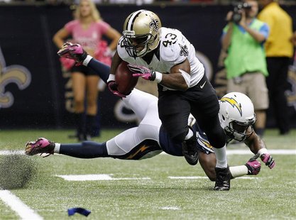 New Orleans Saints running back Darren Sproles (43) returns a kick during the second half of their NFL football game against the San Diego C New Orleans Saints running back Darren Sproles (43) returns a kick during the second half of their NFL football game against the San Diego C