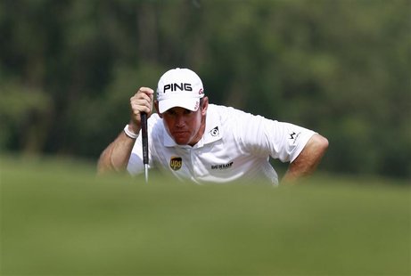Lee Westwood of England lines up a putt on the ninth green where he shot a birdie during the third day of the WGC-HSBC Champions Tournament Lee Westwood of England lines up a putt on the ninth green where he shot a birdie during the third day of the WGC-HSBC Champions Tournament