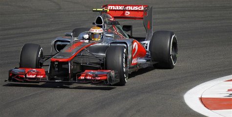 McLaren Formula One driver Lewis Hamilton of Britain drives during the first practice session of the Abu Dhabi F1 Grand Prix at the Yas Mari McLaren Formula One driver Lewis Hamilton of Britain drives during the first practice session of the Abu Dhabi F1 Grand Prix at the Yas Mari