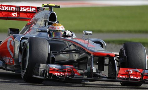 McLaren Formula One driver Lewis Hamilton of Britain drives during the third practice session of the Abu Dhabi F1 Grand Prix at the Yas Mari McLaren Formula One driver Lewis Hamilton of Britain drives during the third practice session of the Abu Dhabi F1 Grand Prix at the Yas Mari