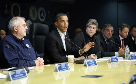 U.S. President Barack Obama (C) attends a briefing with FEMA administrator Craig Fugate (L) and cabinet secretaries about operations in the U.S. President Barack Obama (C) attends a briefing with FEMA administrator Craig Fugate (L) and cabinet secretaries about operations in the