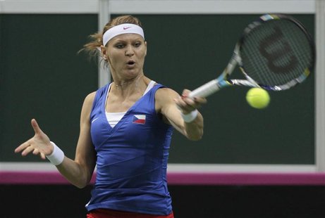Czech Republic's Lucie Safarova returns a ball to Serbia's Ana Ivanovic during their final match of the Fed Cup tennis tournament in Prague Czech Republic's Lucie Safarova returns a ball to Serbia's Ana Ivanovic during their final match of the Fed Cup tennis tournament in Prague