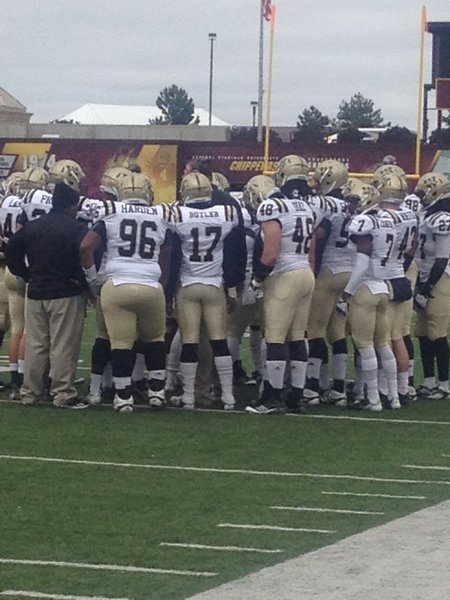 The Broncos huddle on the sideline. WMU @ CMU 11/3/12