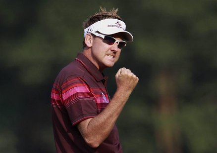 Ian Poulter of England celebrates on the 18th green after winning the WGC-HSBC Champions Tournament at Mission Hills in the southern Chinese Ian Poulter of England celebrates on the 18th green after winning the WGC-HSBC Champions Tournament at Mission Hills in the southern Chinese