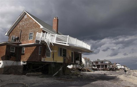 A home damaged by Hurricane Sandy is seen between the ocean and Rt 35 in Bayhead, New Jersey, November 2, 2012 in this handout image courtes A home damaged by Hurricane Sandy is seen between the ocean and Rt 35 in Bayhead, New Jersey, November 2, 2012 in this handout image courtes