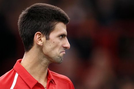 Novak Djokovic of Serbia reacts during his match against Sam Querrey of the U.S. during the Paris Masters tennis tournament October 31, 2012 Novak Djokovic of Serbia reacts during his match against Sam Querrey of the U.S. during the Paris Masters tennis tournament October 31, 2012