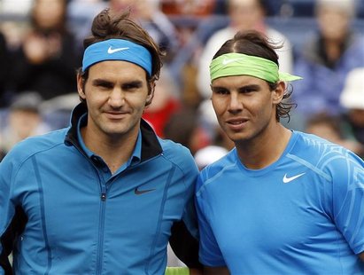 Roger Federer (L) of Switzerland and Rafael Nadal (R) of Spain pose together before their men's semi-final match at the Indian Wells ATP ten Roger Federer (L) of Switzerland and Rafael Nadal (R) of Spain pose together before their men's semi-final match at the Indian Wells ATP ten