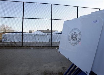Voting machines are delivered to a make-shift polling center in the playground of a flood damaged school in the Rockaways neighborhood of th Voting machines are delivered to a make-shift polling center in the playground of a flood damaged school in the Rockaways neighborhood of th