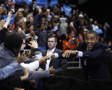 U.S. President Barack Obama greets supporters during an election campaign rally in Cincinnati, Ohio, November 4, 2012.
REUTERS/Jason Reed U.S. President Barack Obama greets supporters during an election campaign rally in Cincinnati, Ohio, November 4, 2012.
REUTERS/Jason Reed