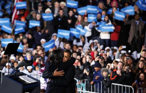 First lady Michelle Obama hugs U.S. President Barack Obama on last night of campaigning while in Des Moines, Iowa, November 5, 2012. REUTERS First lady Michelle Obama hugs U.S. President Barack Obama on last night of campaigning while in Des Moines, Iowa, November 5, 2012. REUTERS