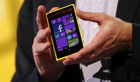 Microsoft CEO Steve Ballmer displays a Nokia Lumia 920 featuring Windows Phone 8 during an event in San Francisco, California October 29, 20 Microsoft CEO Steve Ballmer displays a Nokia Lumia 920 featuring Windows Phone 8 during an event in San Francisco, California October 29, 20