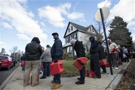 Residents line up for gasoline at a temporary fueling station at the National Guard armory in the Staten Island Borough of New York, Novembe Residents line up for gasoline at a temporary fueling station at the National Guard armory in the Staten Island Borough of New York, Novembe
