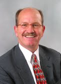 Bronson Senior Vice President John Jones Jr. says their is strength in numbers, and savings too. . Bronson Senior Vice President John Jones Jr. says their is strength in numbers, and savings too. .