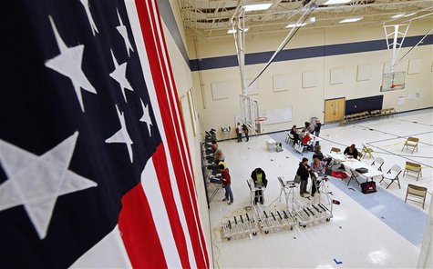 Voters cast ballots at a polling station at Freedom Academy in the U.S. presidential election in Provo, Utah, November 6, 2012. REUTERS/Geor Voters cast ballots at a polling station at Freedom Academy in the U.S. presidential election in Provo, Utah, November 6, 2012. REUTERS/Geor