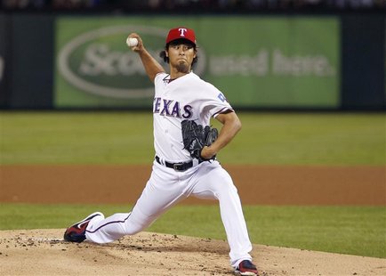 Texas Rangers pitcher Yu Darvish throws against the Baltimore Orioles in the first inning of their MLB American League Wild Card playoff bas Texas Rangers pitcher Yu Darvish throws against the Baltimore Orioles in the first inning of their MLB American League Wild Card playoff bas