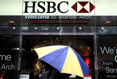 A customer enters a branch of HSBC bank in central London November 8, 2008. REUTERS/Luke MacGregor A customer enters a branch of HSBC bank in central London November 8, 2008. REUTERS/Luke MacGregor