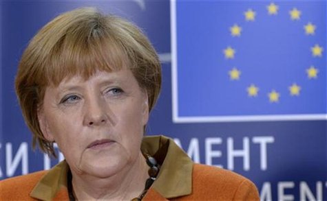 Germany's Chancellor Angela Merkel holds a news conference after addressing the political groups at the European Parliament in Brussels Nove Germany's Chancellor Angela Merkel holds a news conference after addressing the political groups at the European Parliament in Brussels Nove