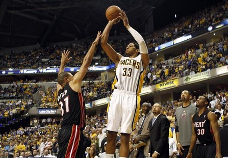 Indiana Pacers forward Danny Granger (33) shoots the basketball defended by Miami Heat forward Shane Battier during the fourth quarter of Ga Indiana Pacers forward Danny Granger (33) shoots the basketball defended by Miami Heat forward Shane Battier during the fourth quarter of Ga
