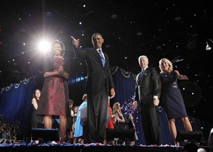 U.S. President Barack Obama (2nd L) celebrates with his wife Michelle, his Vice President Joe Biden and Biden's wife Jill (L-R) after winnin U.S. President Barack Obama (2nd L) celebrates with his wife Michelle, his Vice President Joe Biden and Biden's wife Jill (L-R) after winnin