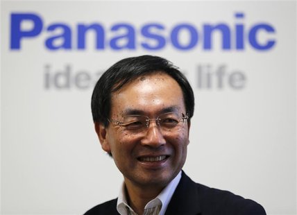 Panasonic Corp's new president Kazuhiro Tsuga poses in front of the company's logo before his interview in Tokyo July 9, 2012. REUTERS/Kim K Panasonic Corp's new president Kazuhiro Tsuga poses in front of the company's logo before his interview in Tokyo July 9, 2012. REUTERS/Kim K