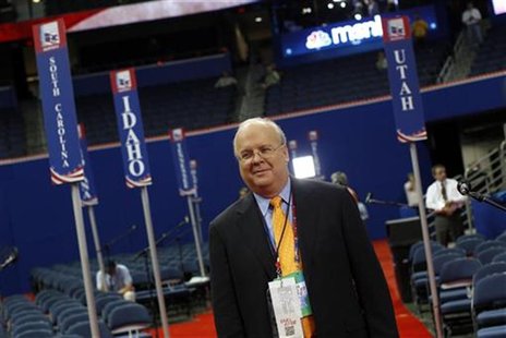 Republican political strategist Karl Rove walks the floor of the Republican National Convention before the start of first session of the con Republican political strategist Karl Rove walks the floor of the Republican National Convention before the start of first session of the con