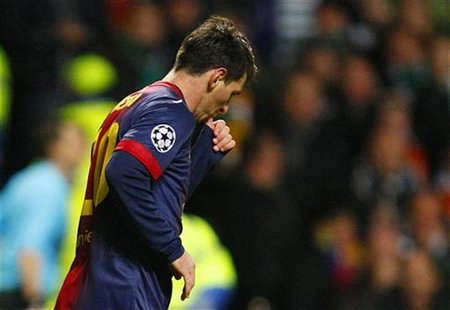 Barcelona's Lionel Messi celebrates scoring a goal during their Champions League soccer match against Celtic at Celtic Park stadium in Glasg Barcelona's Lionel Messi celebrates scoring a goal during their Champions League soccer match against Celtic at Celtic Park stadium in Glasg