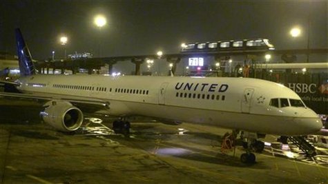 A United Airlines airplane painted in its new corporate logo sits at a gate at Liberty International Airport in Newark, New Jersey, February A United Airlines airplane painted in its new corporate logo sits at a gate at Liberty International Airport in Newark, New Jersey, February