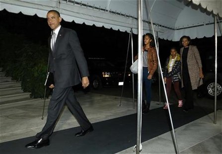 U.S. President Barack Obama, his wife Michelle and their daughters Malia (3rd R) and Sasha (2nd R) return after his re-election, to the Whit U.S. President Barack Obama, his wife Michelle and their daughters Malia (3rd R) and Sasha (2nd R) return after his re-election, to the Whit