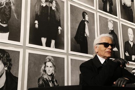Chanel's creative director Karl Lagerfeld poses before the opening of his photo exhibition entitled "Little Black Jacket" at the Grand Palai Chanel's creative director Karl Lagerfeld poses before the opening of his photo exhibition entitled "Little Black Jacket" at the Grand Palai