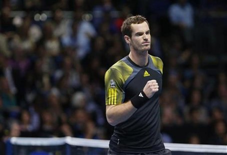 Britain's Andy Murray celebrates winning a game against France's Jo-Wilfried Tsonga during their men's singles tennis match at the ATP World Britain's Andy Murray celebrates winning a game against France's Jo-Wilfried Tsonga during their men's singles tennis match at the ATP World