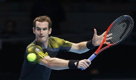 Britain's Andy Murray hits a return to France's Jo-Wilfried Tsonga during their men's singles tennis match at the ATP World Tour Finals at t Britain's Andy Murray hits a return to France's Jo-Wilfried Tsonga during their men's singles tennis match at the ATP World Tour Finals at t